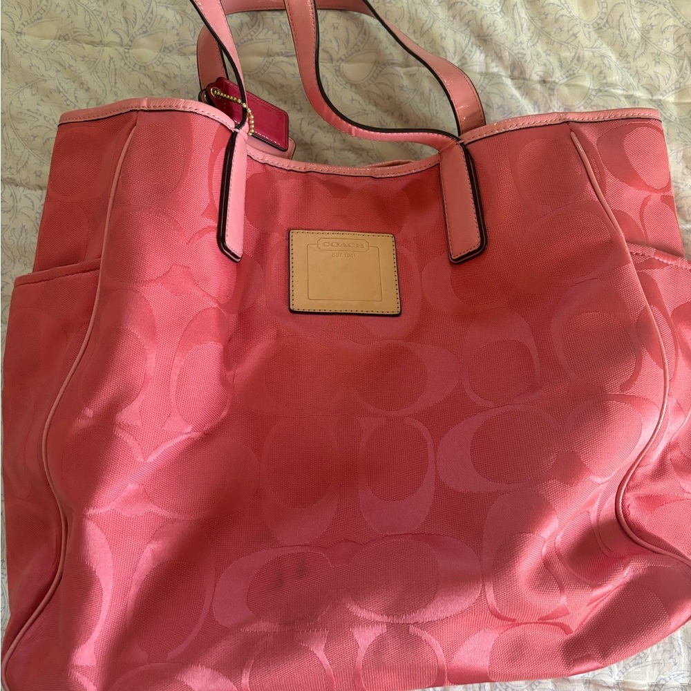 Coach travel bag (coral color)
